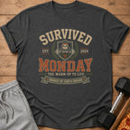 Dark grey t-shirt with "Survived Monday" and a sloth lifting weights graphic.