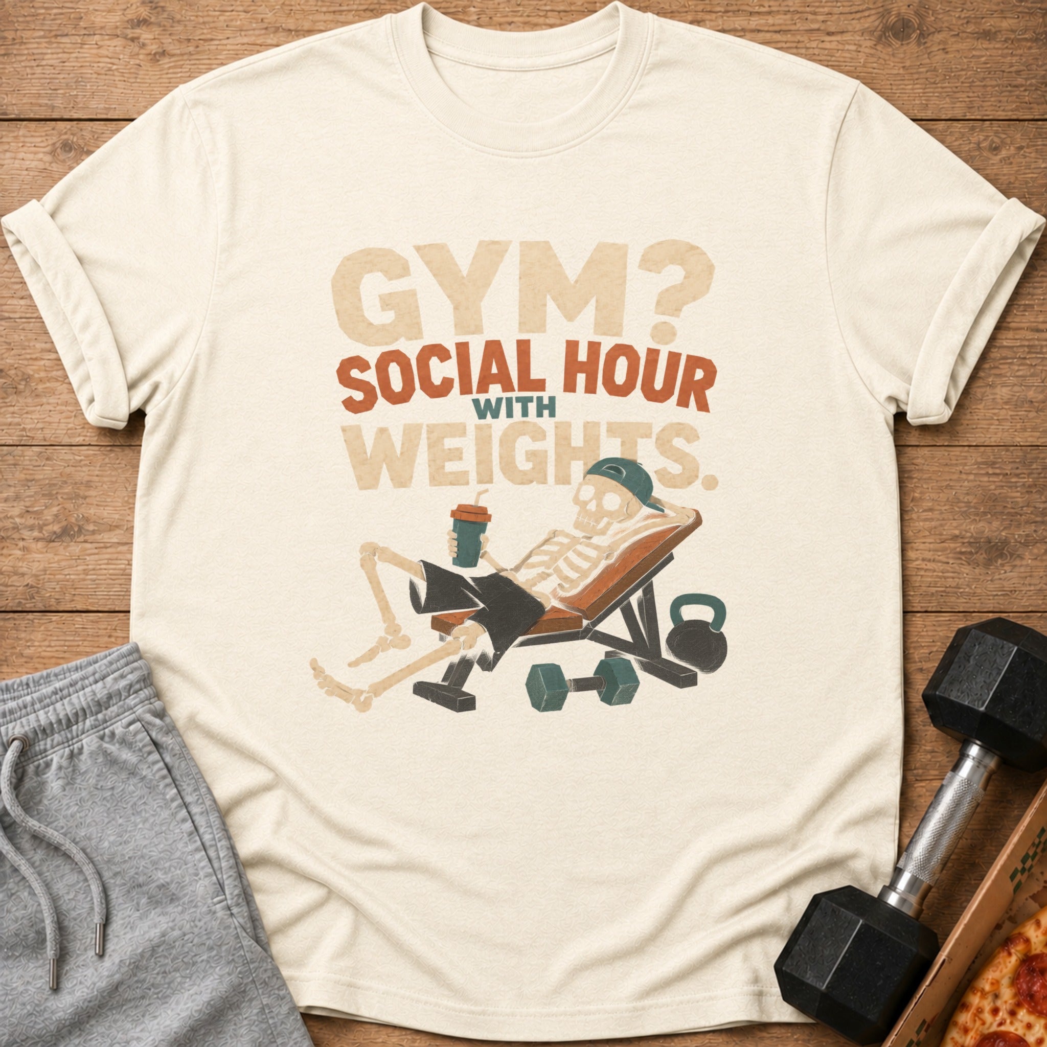Skeleton relaxing on a bench with dumbbells and text "GYM? SOCIAL HOUR WITH WEIGHTS."