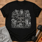 Black t-shirt with illustration of animals eating snacks and text "respect the snack pack".