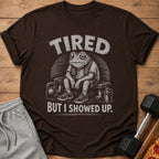 Brown t-shirt with tired frog graphic and text "TIRED BUT I SHOWED UP."