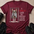 Maroon t-shirt with a sloth hanging on a pull-up bar and the text "I showed up late but spiritually I never arrived."