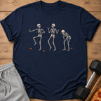 Navy t-shirt with three dancing skeletons and autumn leaves graphic.