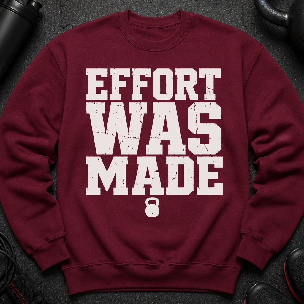 Maroon sweatshirt with distressed text "EFFORT WAS MADE" and a kettlebell graphic.
