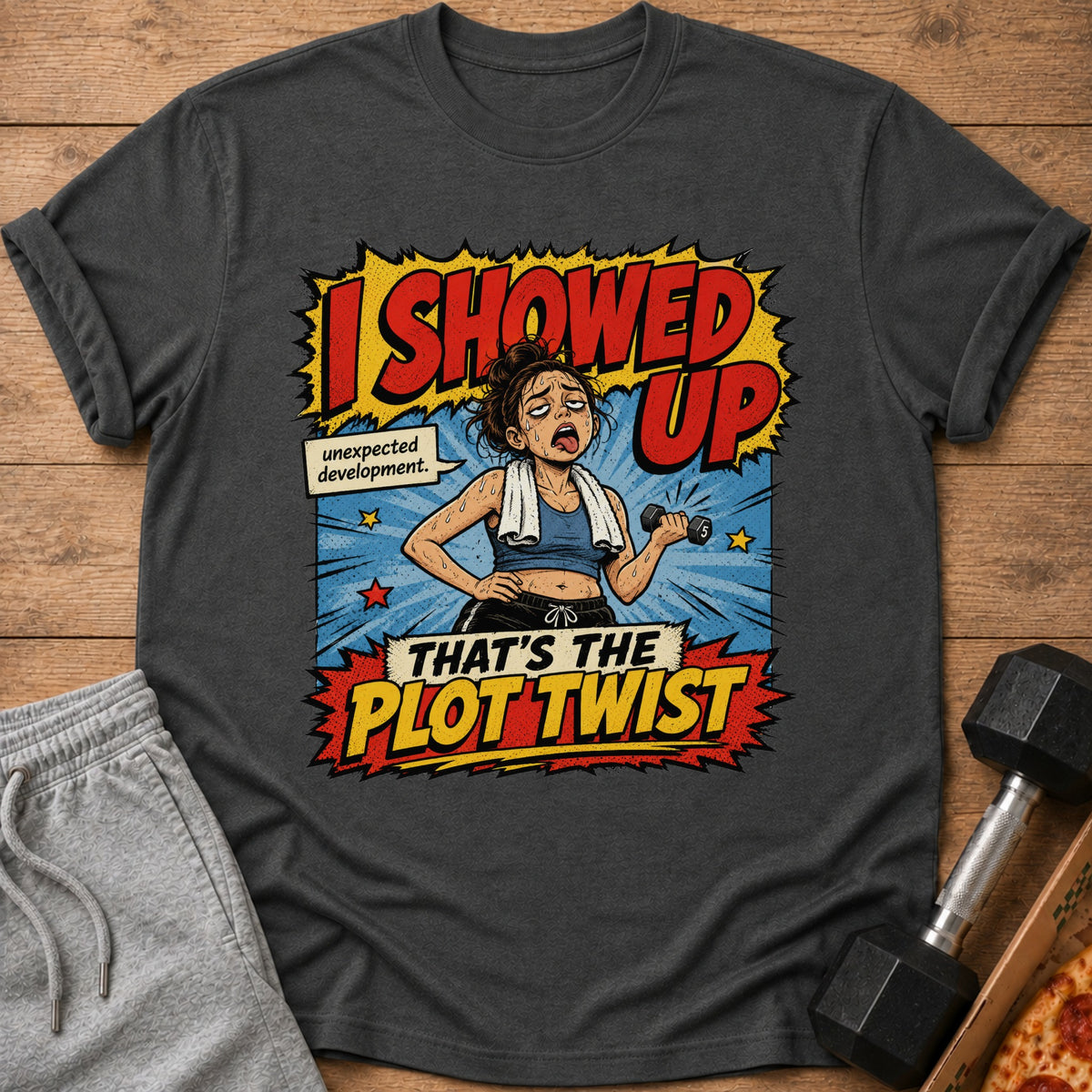 T-shirt with comic art of a tired woman lifting weights, text "I SHOWED UP".