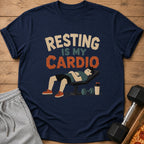 Dark blue t-shirt with text "Resting is my Cardio" and cartoon man sleeping on bench.