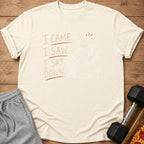 Cream t-shirt with text "I CAME. I SAW. I SAT DOWN." and sloth gym graphic.