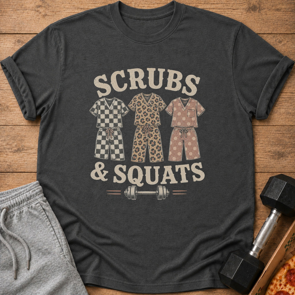 Dark t-shirt with "Scrubs & Squats" text and three pajama sets above a barbell.