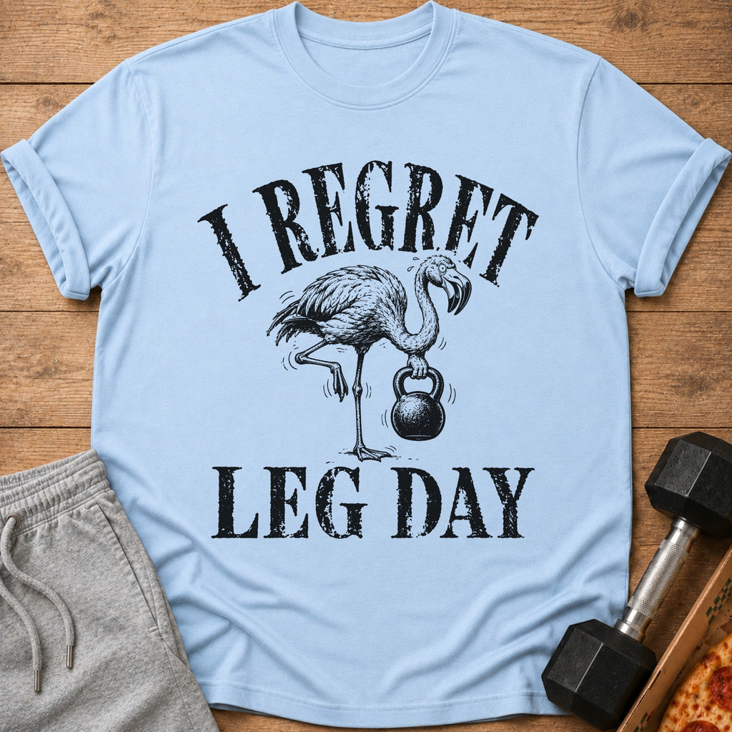 Light blue t-shirt with flamingo holding kettlebell and text "I REGRET LEG DAY".