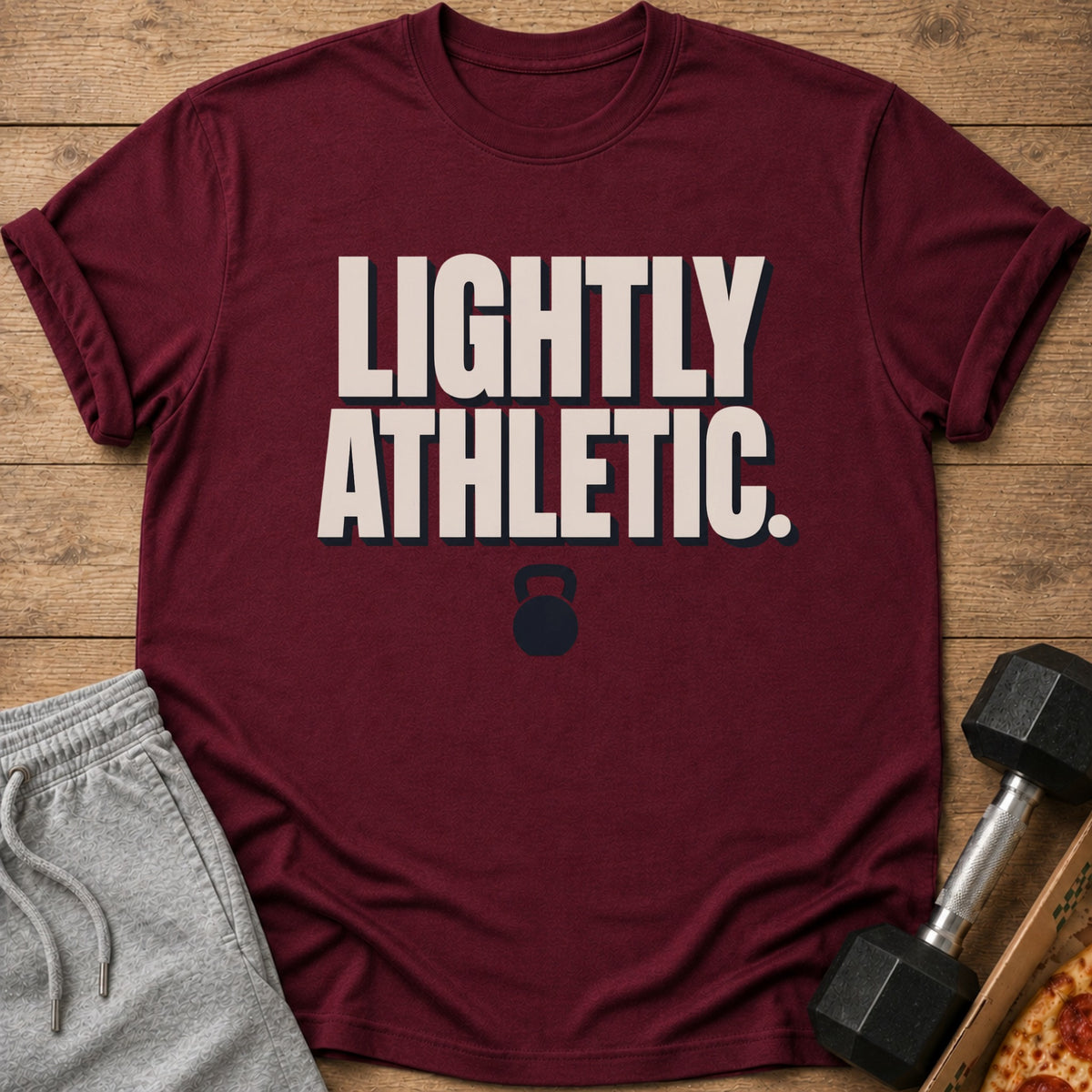Maroon t-shirt with "LIGHTLY ATHLETIC." text and a kettlebell graphic.