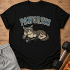 Black t-shirt with "PAWGRESS" text and a tired cat with a dumbbell.