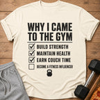 Cream t-shirt with "Why I Came to the Gym" and checklist text.