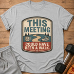 Grey t-shirt with "This meeting could have been a walk" text and graphics.