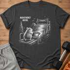 T-shirt graphic of a hamster on a treadmill with "Marathons? Maybe." text and a finish line.
