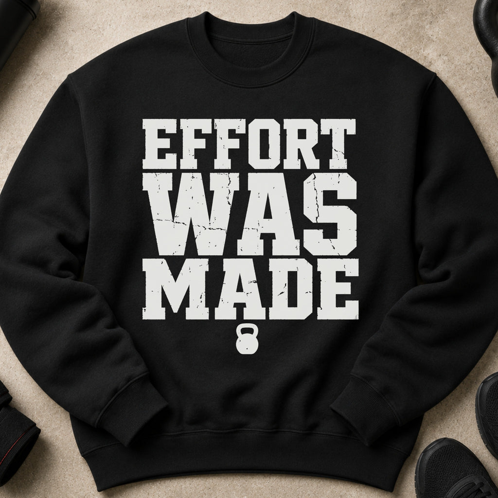 Black sweatshirt with white text "EFFORT WAS MADE" and a kettlebell graphic.