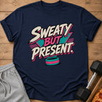 Navy t-shirt with "SWEATY BUT PRESENT" text and a retro aesthetic.