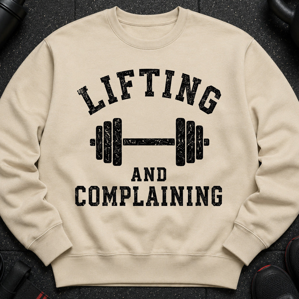 Light beige sweatshirt with black text "Lifting and Complaining" and a dumbbell graphic.