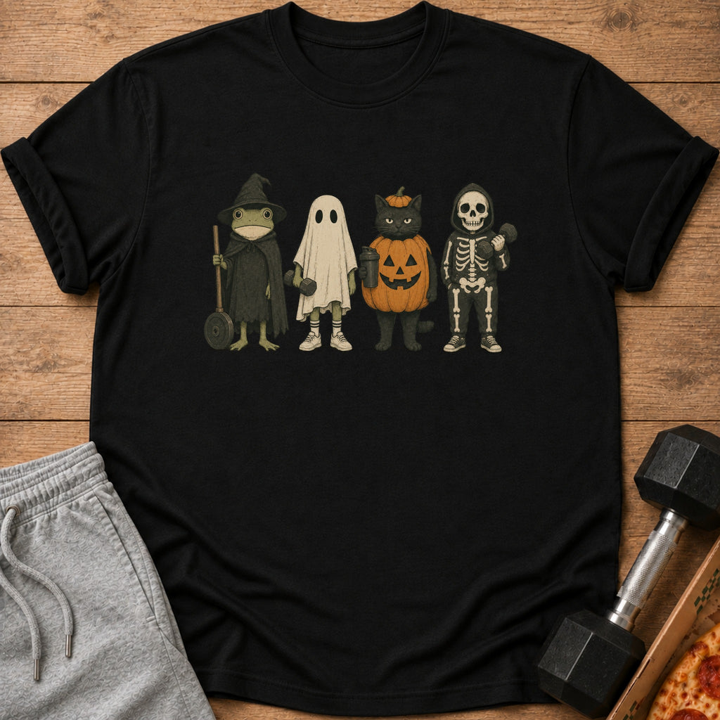 Black t-shirt with graphic of four costumed characters: frog wizard, ghost, pumpkin cat, and skeleton.