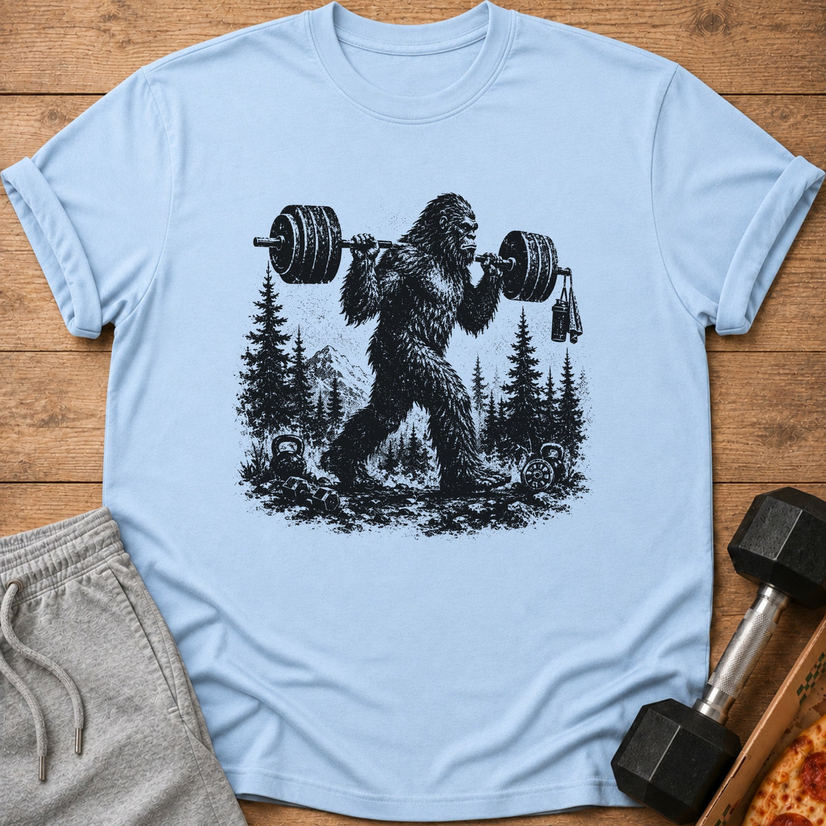 Bigfoot lifting weights in a forest with mountains and kettlebells.