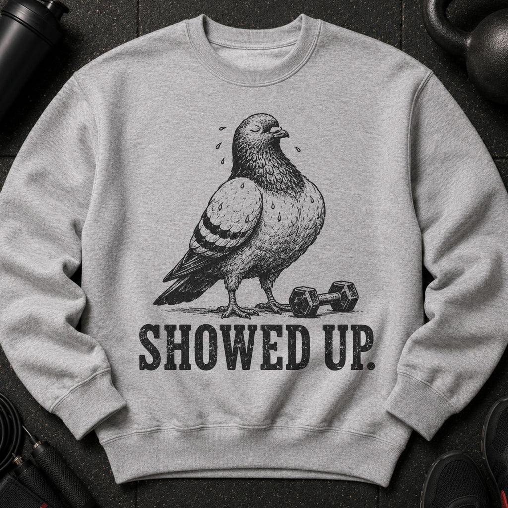 Sweatshirt with a cartoon pigeon and dumbbell graphic, text reads "SHOWED UP."