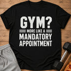 Black t-shirt with "Gym? More Like A Mandatory Appointment" graphic.