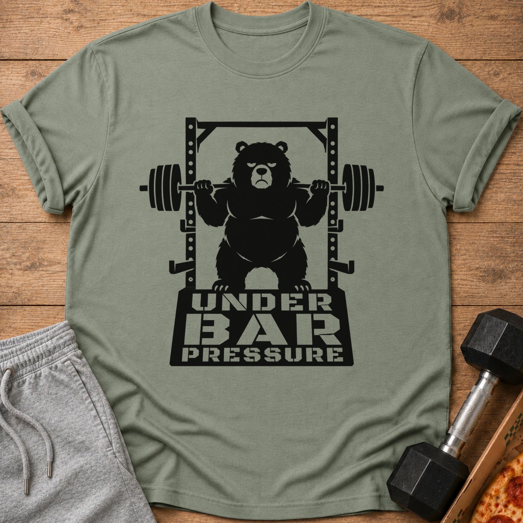 Black bear lifting barbell with text "UNDER BAR PRESSURE" on shirt.