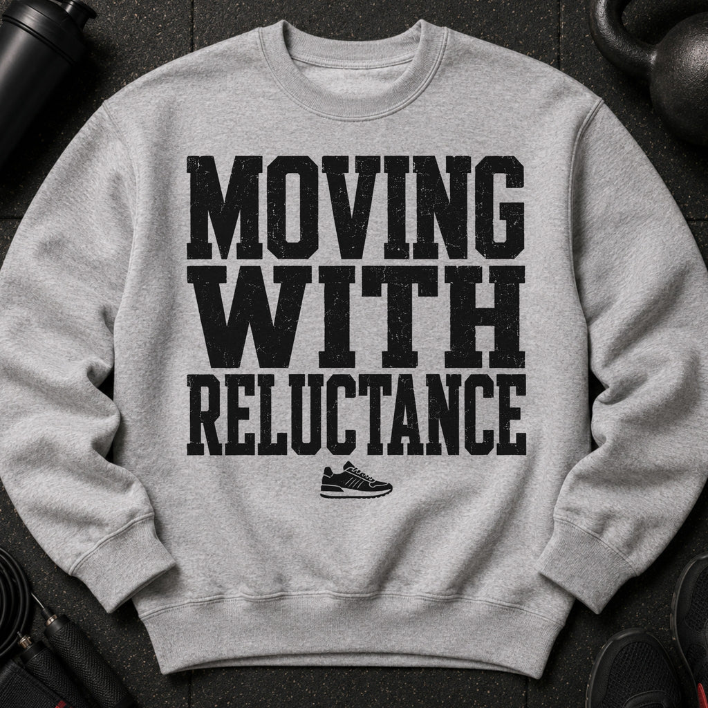 Grey crewneck sweatshirt with black text "MOVING WITH RELUCTANCE" and a sneaker graphic.