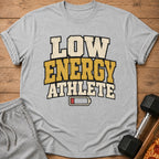 Light grey t-shirt with "LOW ENERGY ATHLETE" text and a low battery symbol.
