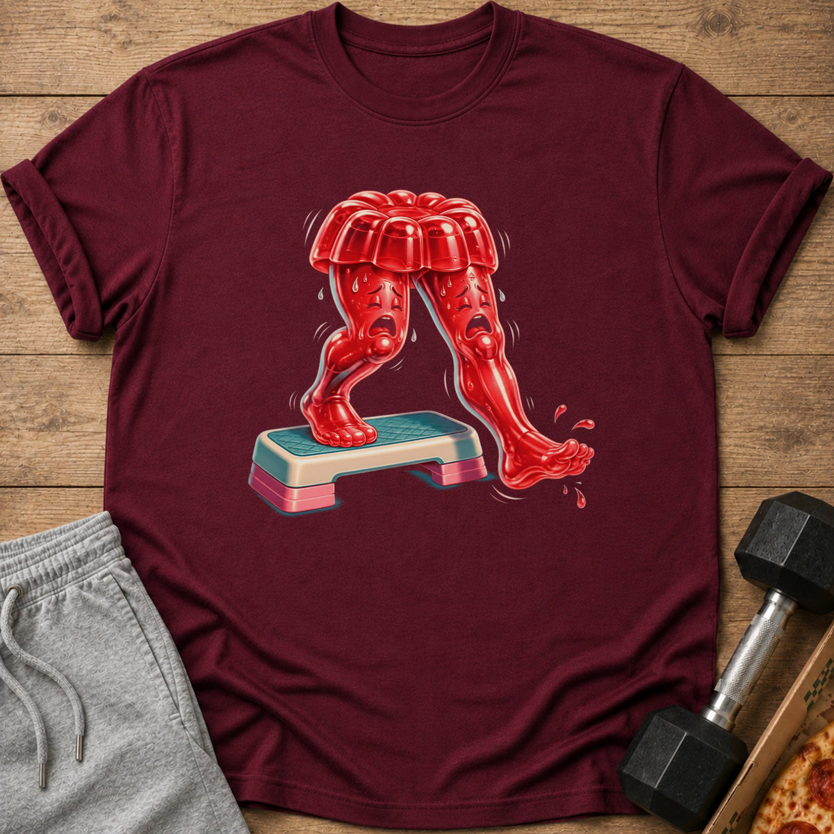 Red jelly legs with sad faces stepping on a pink and blue aerobic step.