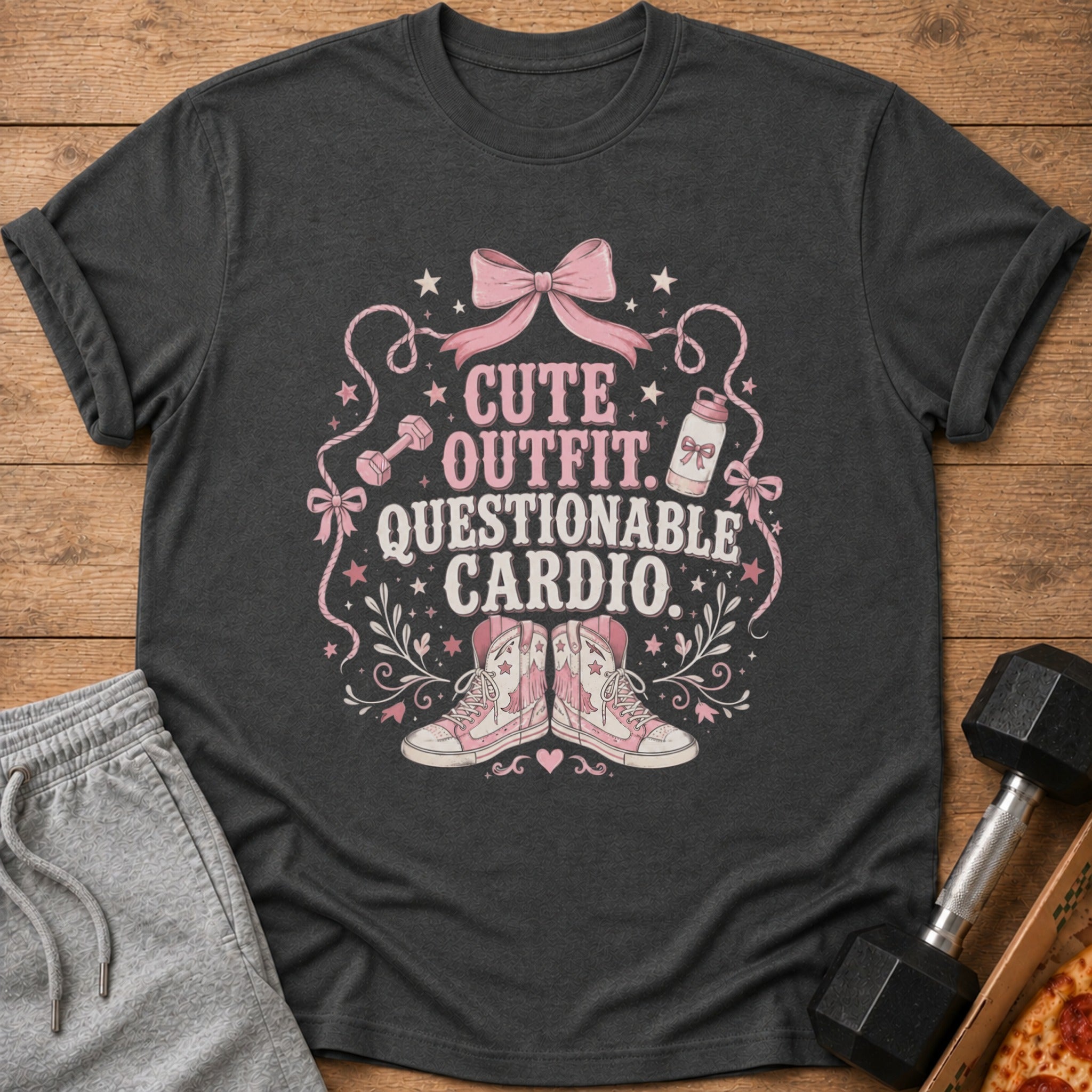 Dark gray t-shirt with "CUTE OUTFIT. QUESTIONABLE CARDIO." text and gym graphics.