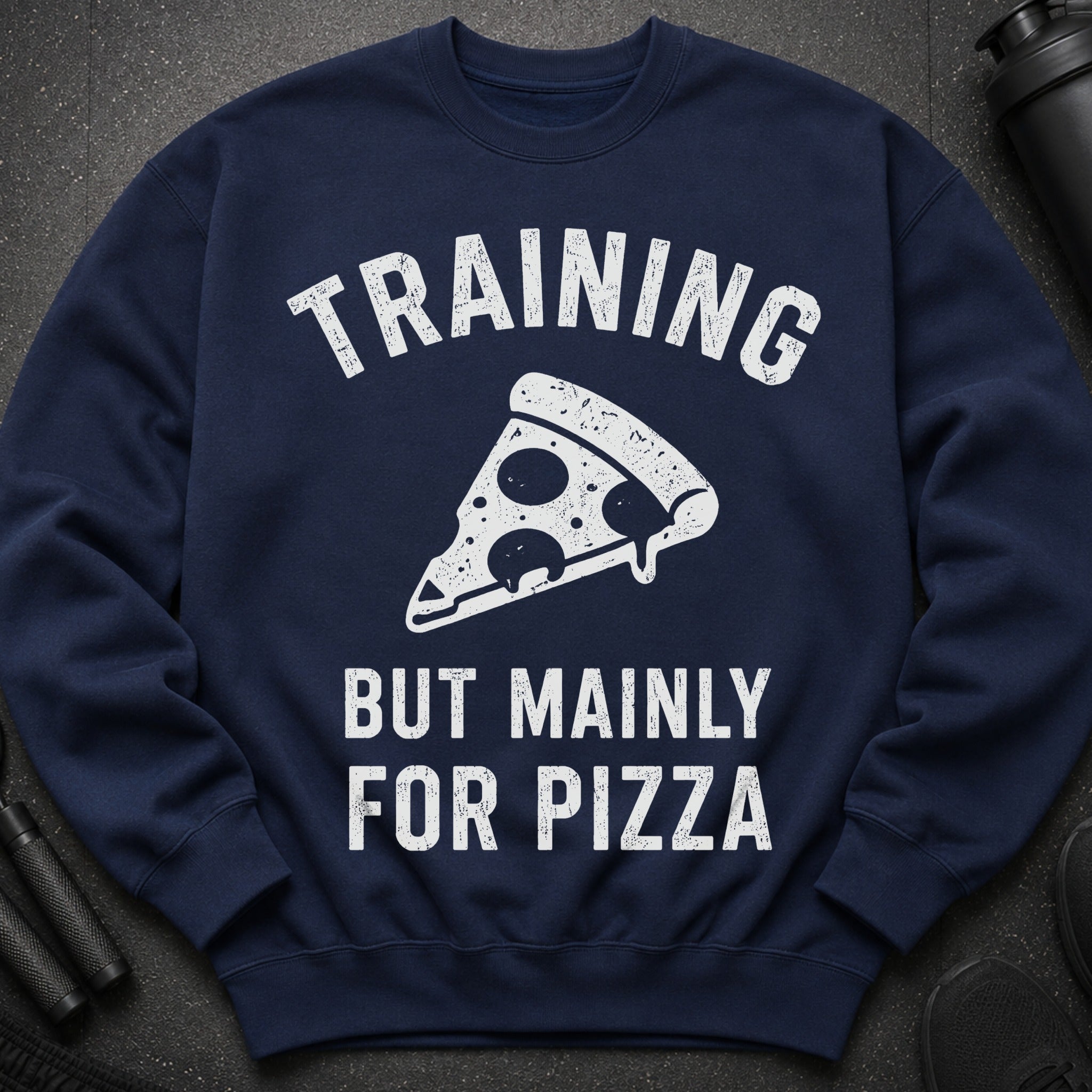 Navy sweatshirt with "TRAINING BUT MAINLY FOR PIZZA" and pizza slice graphic.