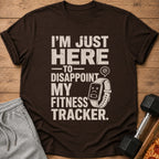 Brown t-shirt with distressed text "I'm just here to disappoint my fitness tracker."