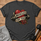 T-shirt with a broken heart, barbell, and rose graphic that reads "Muscles Cry Too".