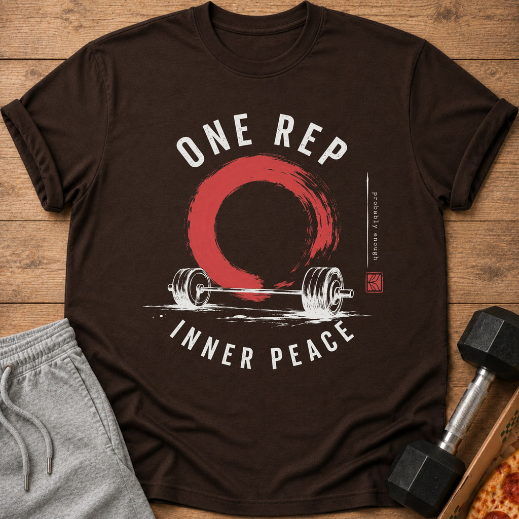 Brown t-shirt with white text "ONE REP INNER PEACE", barbell, and red circle graphic.