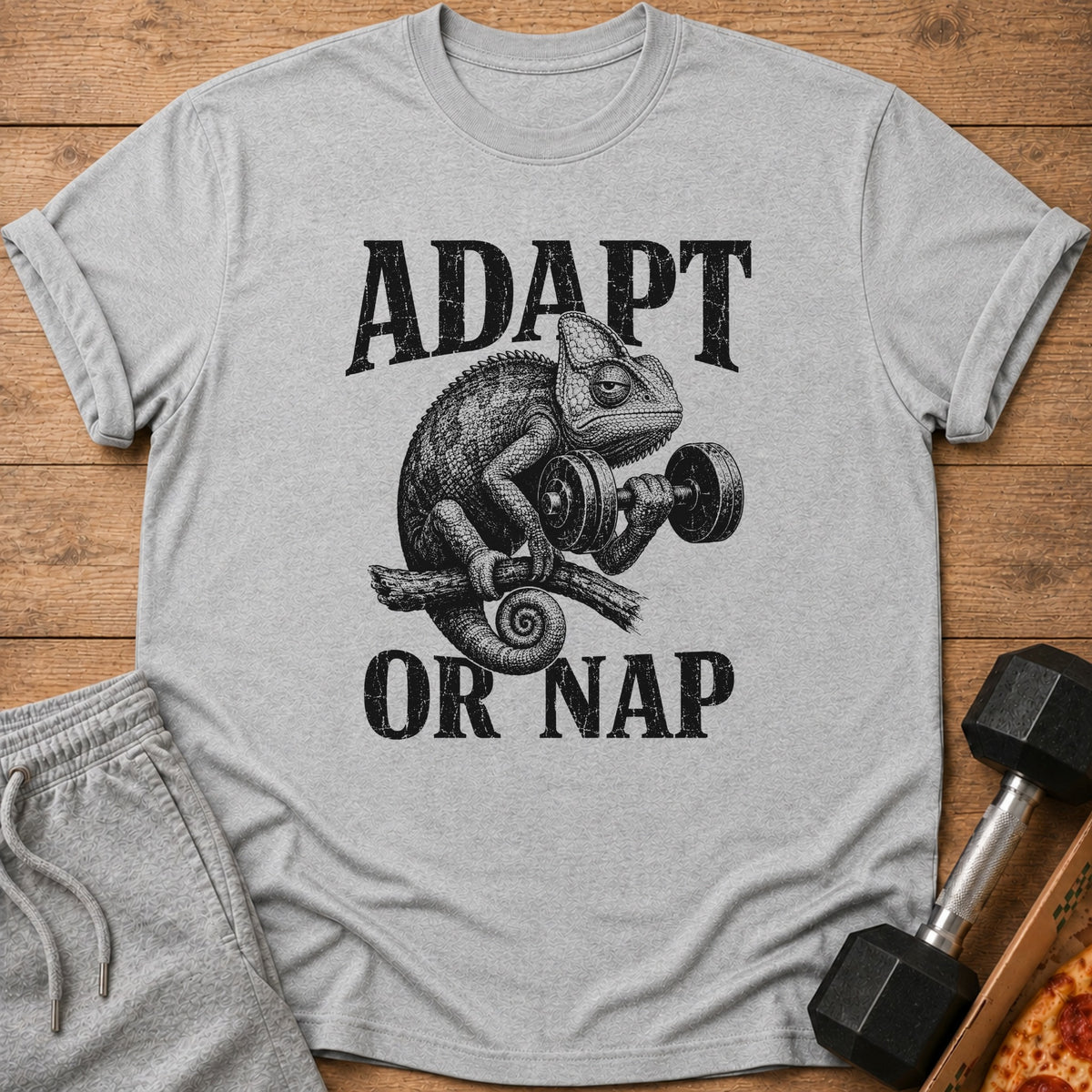 Gray t-shirt with "ADAPT OR NAP" text and a chameleon lifting a dumbbell.