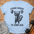 Light blue t-shirt with a skunk lifting a barbell and text "STRONG ENOUGH TO COMPLAIN."