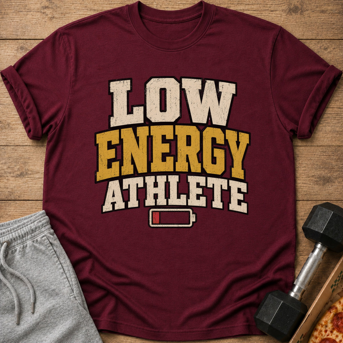 Maroon t-shirt with "Low Energy Athlete" text and a low battery icon.