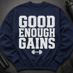 Navy crewneck sweatshirt with "GOOD ENOUGH GAINS" text and dumbbell graphic