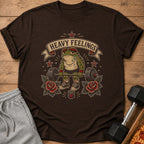 Brown t-shirt featuring a frog wearing a headband and tank top lifting a barbell.