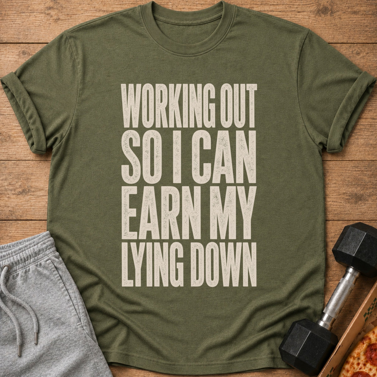 Green t-shirt with text "Working Out So I Can Earn My Lying Down".