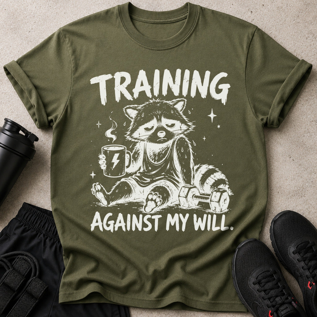 T-shirt with a raccoon drinking coffee, holding a dumbbell, and the text "TRAINING AGAINST MY WILL."