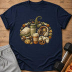 Navy t-shirt with a pumpkin design made of dumbbells, coffee, and snacks.