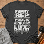 Dark grey t-shirt with white text "EVERY REP IS A PUBLIC APOLOGY TO MY LIFE CHOICES" and barbell graphic.