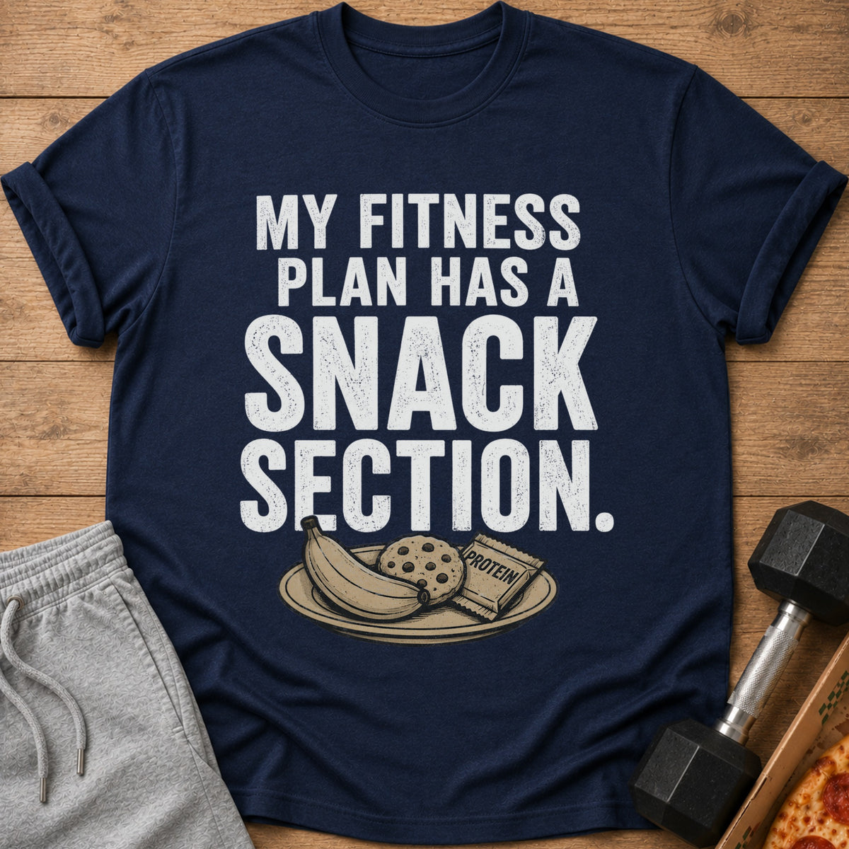 Navy t-shirt with "MY FITNESS PLAN HAS A SNACK SECTION" and images of food.
