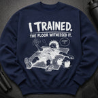 Navy sweatshirt with graphic of exhausted person and text: "I TRAINED. THE FLOOR WITNESSED IT. COUNT IT."