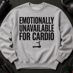 Gray sweatshirt with black text "Emotionally Unavailable For Cardio" and treadmill graphic.