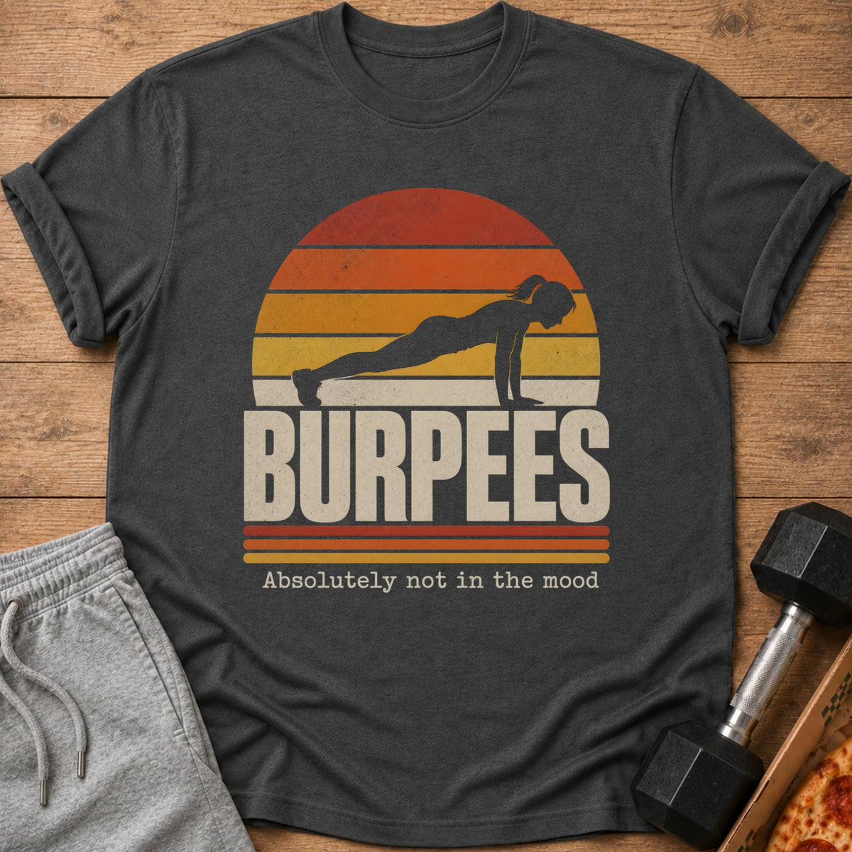 T-shirt with silhouette woman doing a plank, text "BURPEES" and "Absolutely not in the mood".
