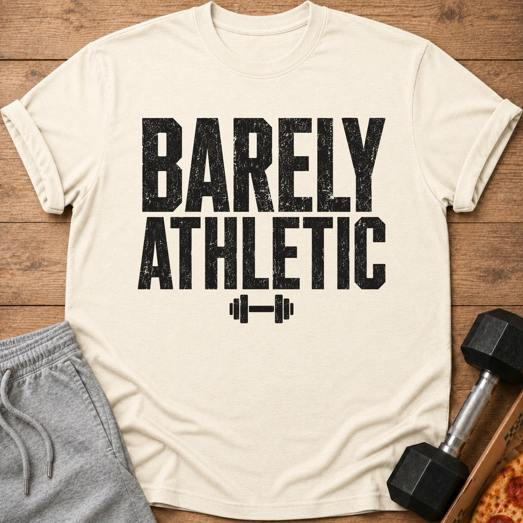 Cream t-shirt with black text "BARELY ATHLETIC" and dumbbell graphic.