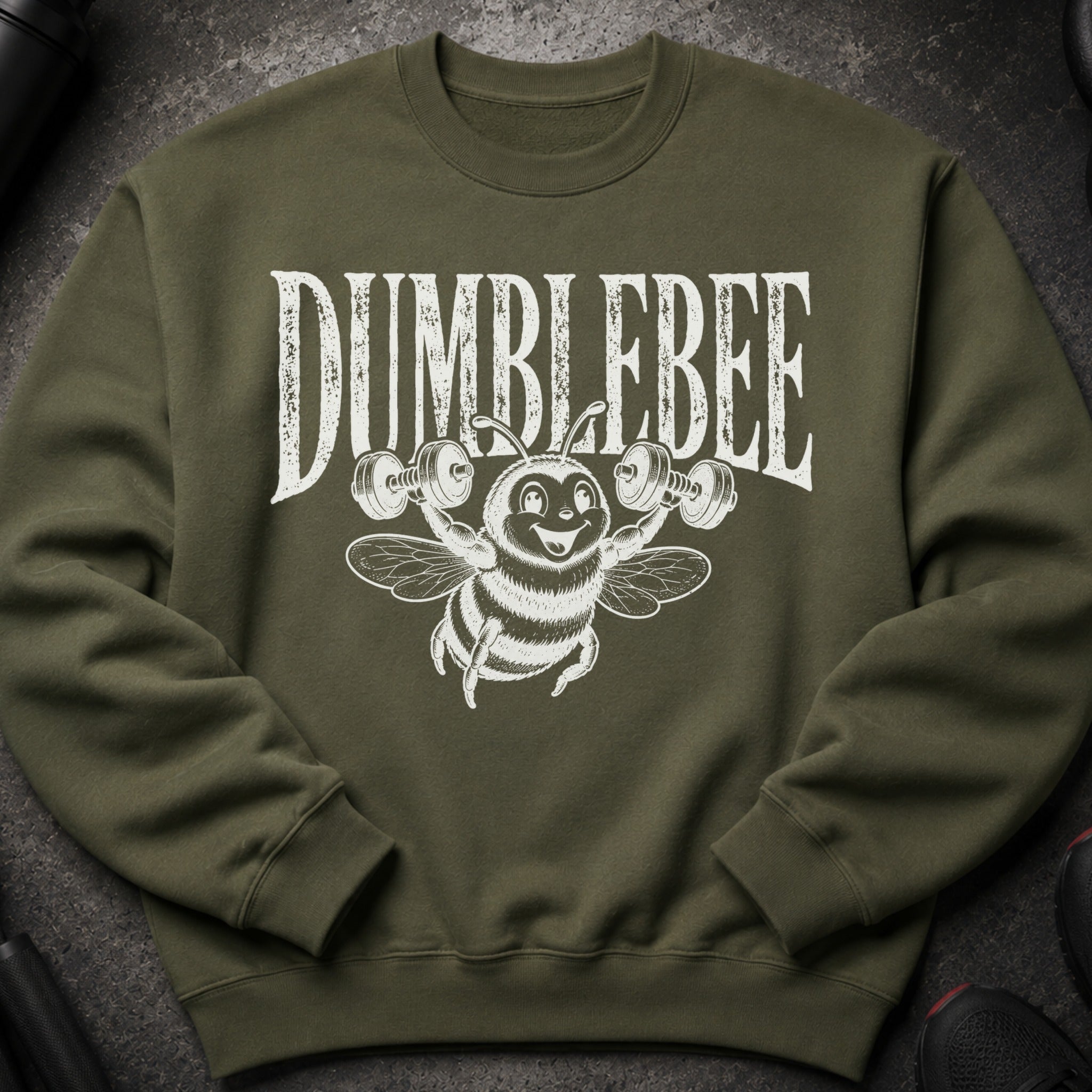 Green sweatshirt with "DUMBLEBEE" text and a cartoon bee lifting weights.