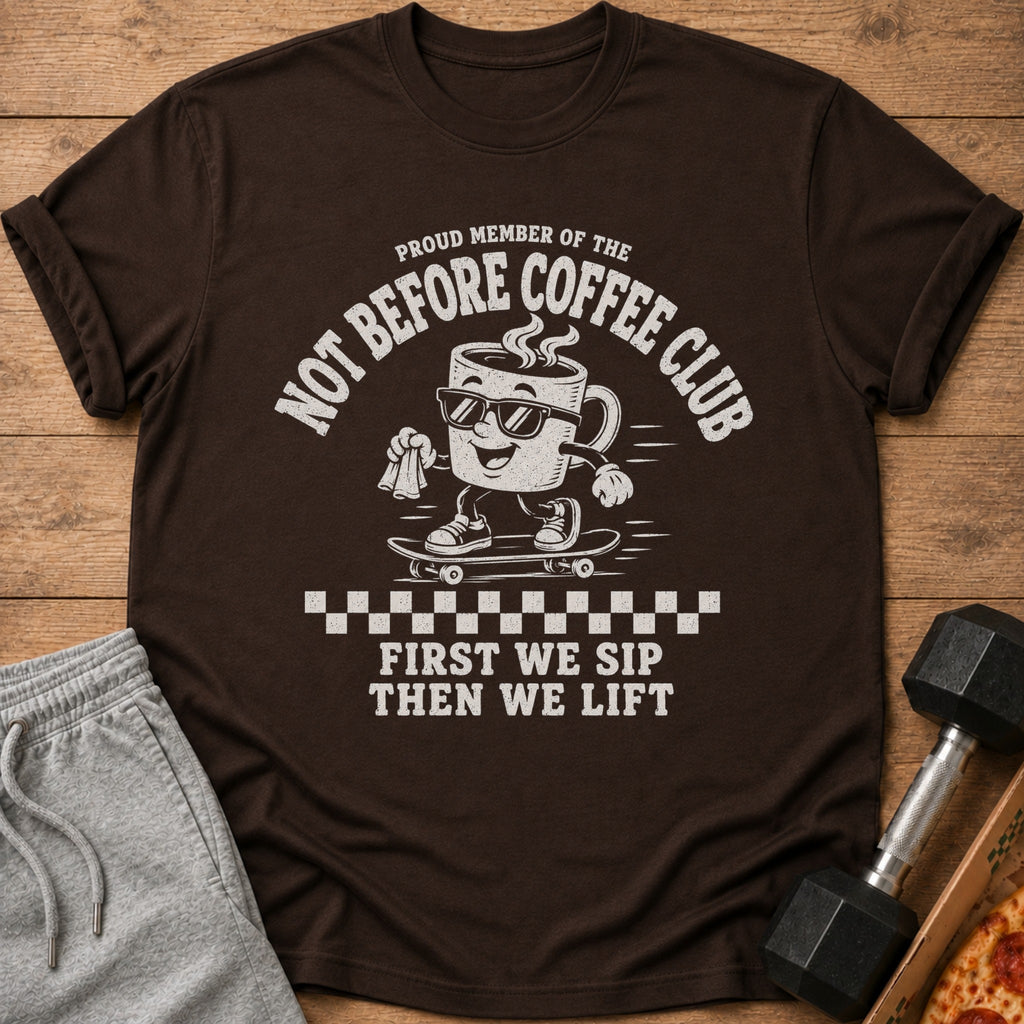 Brown t-shirt with "Proud Member of the Not Before Coffee Club" and cartoon coffee cup.