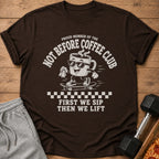 Brown t-shirt with "Proud Member of the Not Before Coffee Club" and cartoon coffee cup.